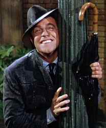 Gene Kelly enjoying a lampost