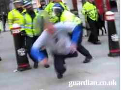 Ian Tomlinson takes a beating