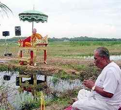 Praying for rain in a dry Pattaya reservoir